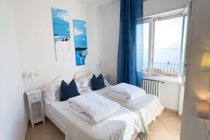 2 quartos, ferros/tábuas de passar roupa, Wi-Fi, roupa de cama