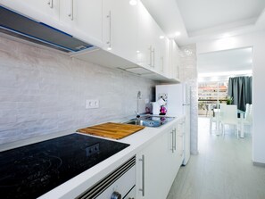 Fridge, oven, coffee/tea maker, toaster