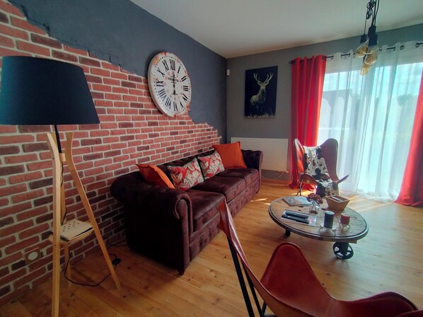 TV, fireplace, books