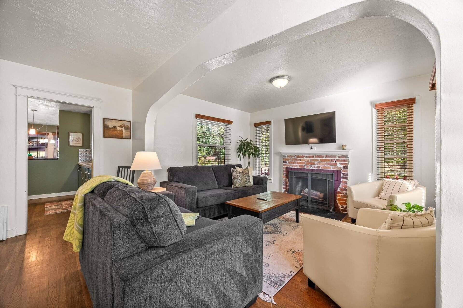 Curl up in the sunlit living room with a smart TV (& cable)!