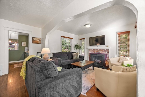 Curl up in the sunlit living room with a smart TV (& cable)!