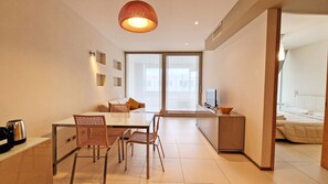 Exclusive Apartment | Living area | 27-inch flat-screen TV with cable channels, TV - Suite La Giudecca (Gallipoli)