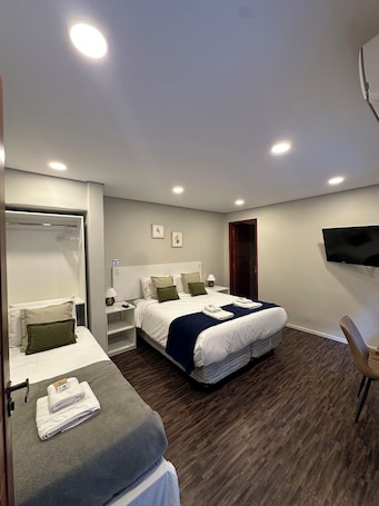 Premium bedding, minibar, desk, laptop workspace