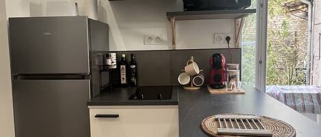 Fridge, microwave, stovetop, coffee/tea maker