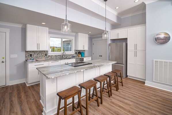 Fridge, microwave, oven, stovetop - Hobbs Realty - Have "Reel Good Times" in this dream home with a private heatable swimming pool! (Holden Beach)