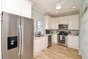 Fridge, microwave, oven, stovetop - Hobbs Realty - “Rose Cliff” | Beautiful Home w/ Heatable Pool, Short Walk to Beach (Holden Beach)