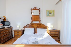 1 habitación, tabla de planchar con plancha, wifi y ropa de cama 