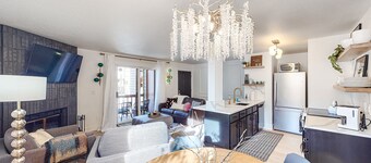 Stylish, lake view condo with fireplace & amazing location - walk to lake & town