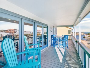 Outdoor dining - Estes Oasis! Canal front home with private lighted dock! Views! Foosball game (Aransas Pass)