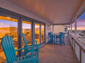 Outdoor dining - Estes Oasis! Canal front home with private lighted dock! Views! Foosball game (Aransas Pass)