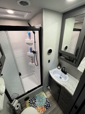 Hair dryer, towels, soap, shampoo