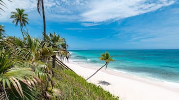 On the beach, sun-loungers, beach towels