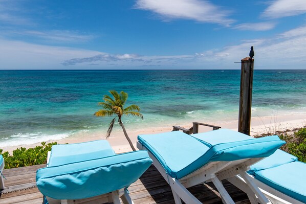 On the beach, sun loungers, beach towels