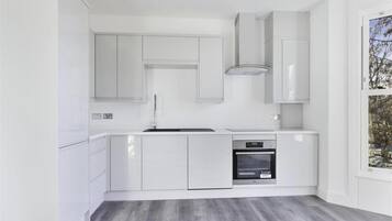 Apartment, Multiple Beds | Private kitchen