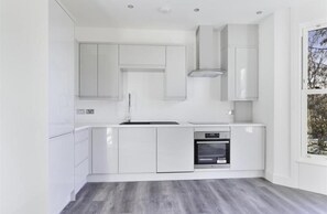 Apartment, Multiple Beds | Private kitchen