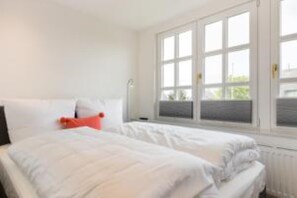 2 Schlafzimmer, Reisekinderbett, kostenloses WLAN, Bettwäsche