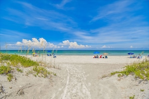 On the beach, sun-loungers, beach towels