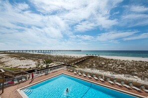 Outdoor pool, a heated pool - It is time to get "Cozy on the Coast" - Navarre Beach Regency #211 (Navarre)