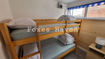 2 dormitorios, tabla de planchar con plancha, wifi gratis y ropa de cama