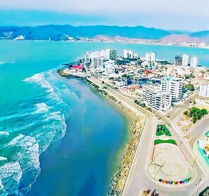 On the beach, sun-loungers