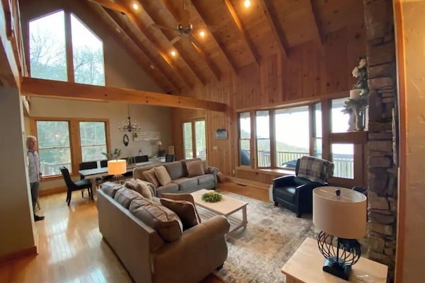 Bring the family and relax in this cozy family room with stunning mountain views