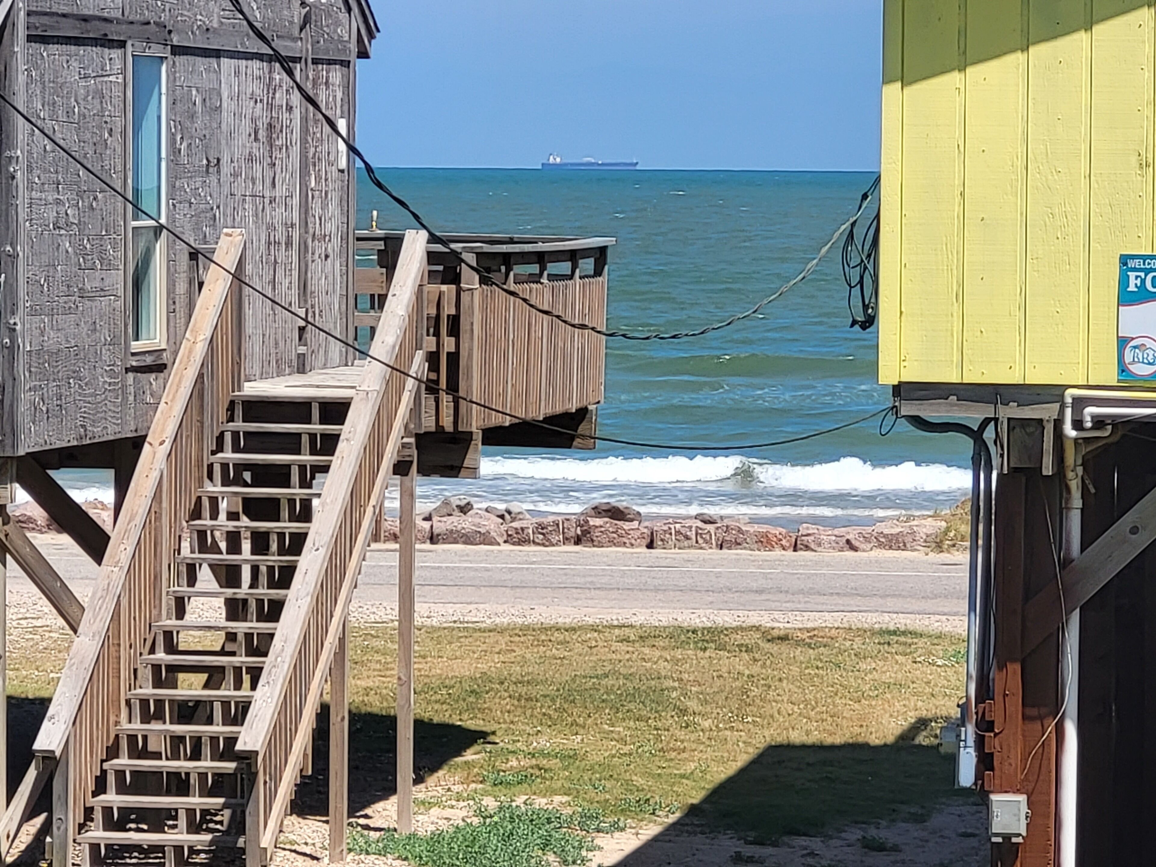 Just a few steps the the ocean from this second row home! 