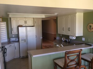 Fridge, microwave, cookware/dishes/utensils