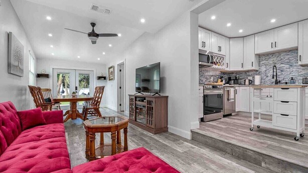 Smart TV, fireplace, offices - Luxury Oasis w/ Pool, Turf Yard, & Privacy Fence (St. Petersburg)