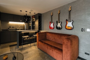 Exclusive Studio Suite, Non Smoking, Kitchenette | Living area | 43-inch Smart TV with cable channels, TV