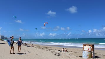 Beach nearby, white sand, sun loungers, beach umbrellas