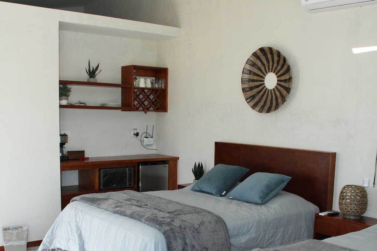 Premium bedding, down duvets, memory-foam beds, minibar