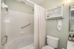 Bathtub, hair dryer, towels