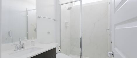 Hair dryer, towels, soap, shampoo