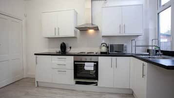 Réfrigérateur dans l'espace commun, micro-ondes dans l'espace commun