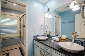 Bathtub, hair dryer, towels