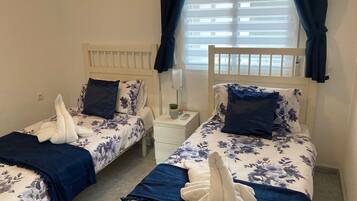 2 dormitoris, planxa i posts de planxar, wifi gratuïta i roba de llit