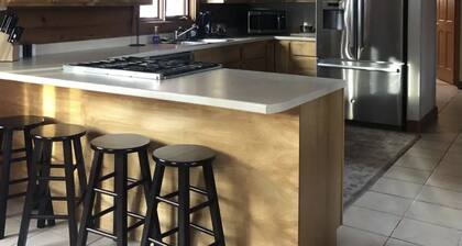 Log cabin on Macintosh Pond access to VAST trail system snowmobile trails.