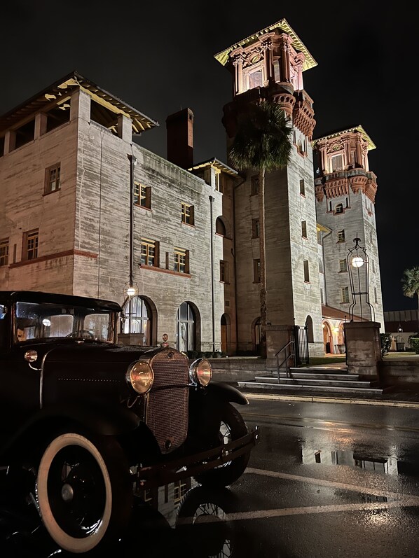 Experience the grandeur of this historic building, featuring a striking tower with ornate details and a vintage charm.
