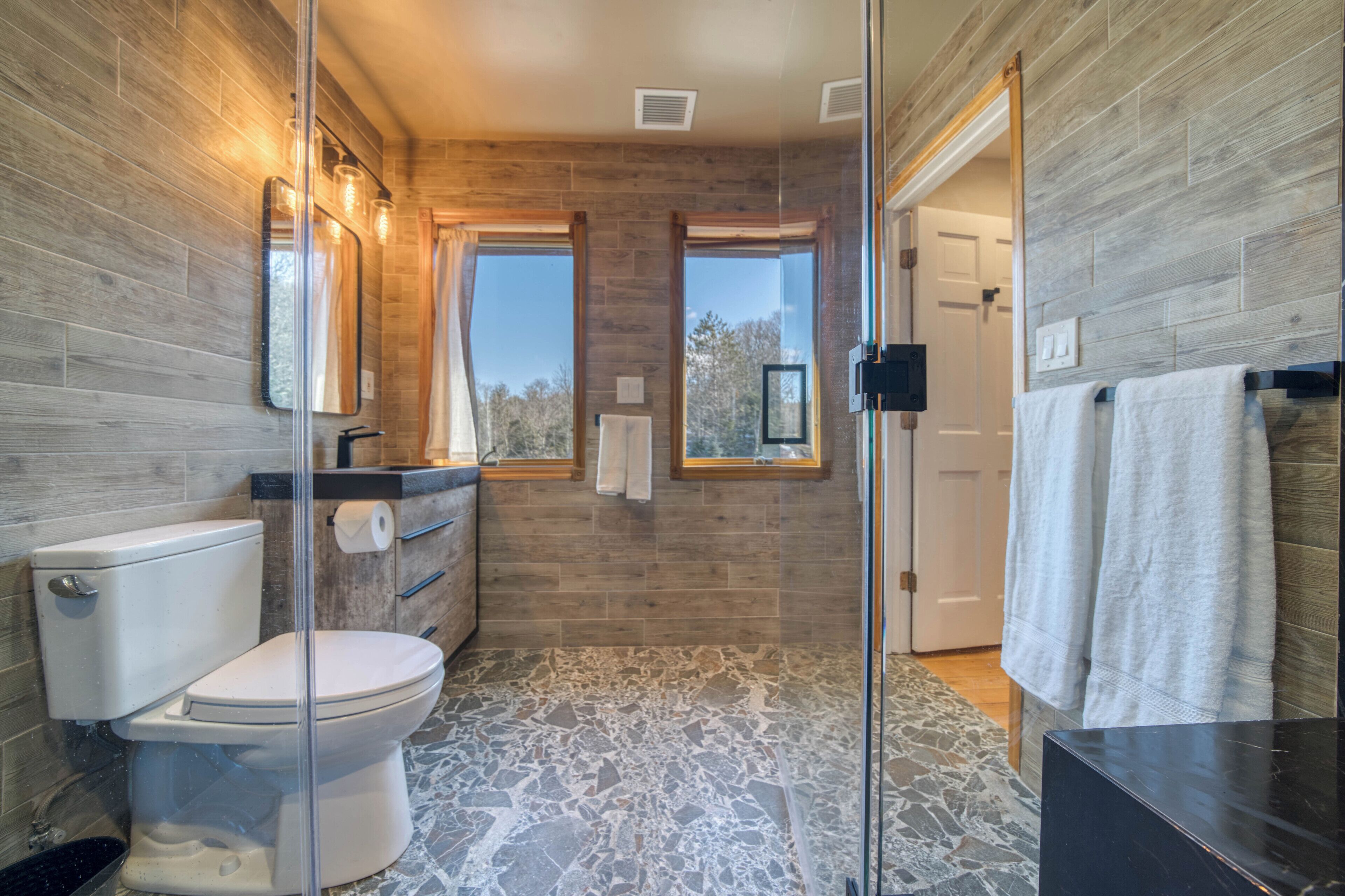 Luxury Duplex | Bathroom | Shower, hydromassage showerhead, designer toiletries, hair dryer