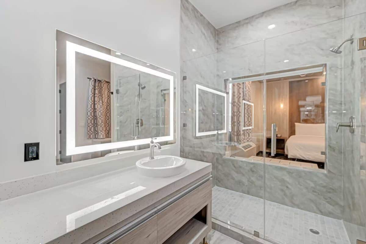 Desk, laptop workspace, blackout drapes, iron/ironing board