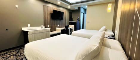 Standard Room, 2 Queen Beds, Non Smoking, Kitchenette | Desk, laptop workspace, blackout drapes, iron/ironing board