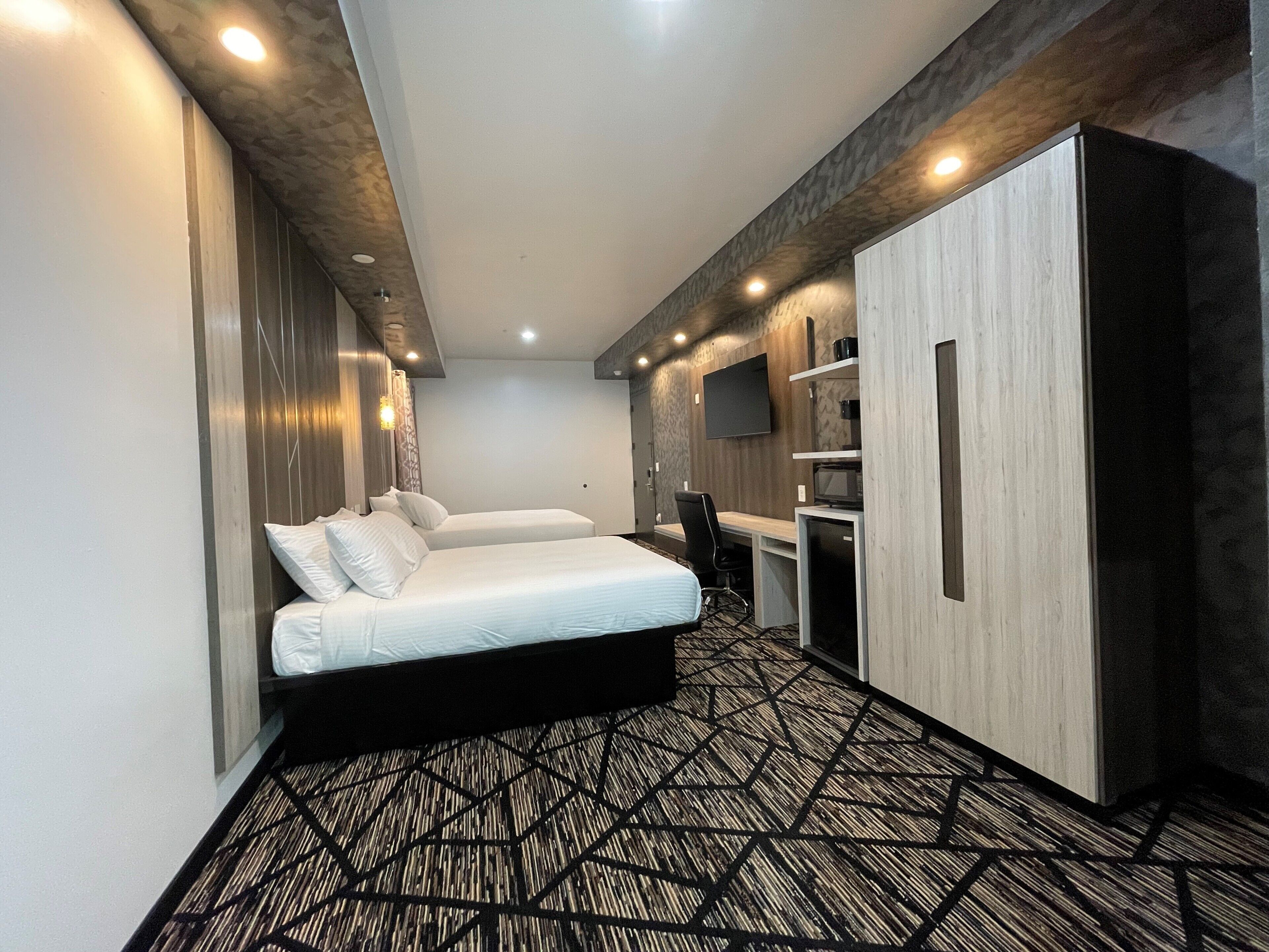 Standard Room, 2 Queen Beds, Non Smoking | Desk, laptop workspace, blackout drapes, iron/ironing board