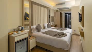 Standardværelse med 2 enkeltsenge | Minibar, pengeskab på værelset, gratis baby-/barnesenge, gratis Wi-Fi