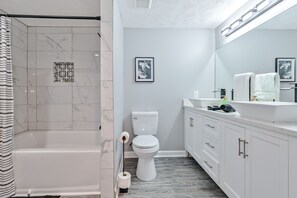 Hair dryer, towels, soap, shampoo