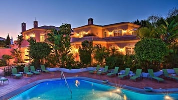 Outdoor pool, open 9:00 AM to 6:00 PM, pool umbrellas, sun loungers