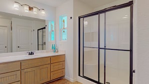 Shower, hair dryer, towels, toilet paper