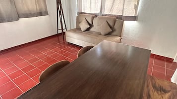 Executive Studio Suite | Living area | 42-inch Smart TV with digital channels, TV, Netflix