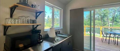 Fridge, microwave, stovetop, coffee/tea maker