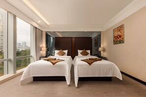 Chambre Deluxe avec lits jumeaux | Couette en duvet, accĂšs au Wi-Fi (inclus)