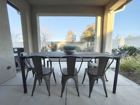 Outdoor dining. Former Model Home, 3 Car Garage, Gym, Sleep 14